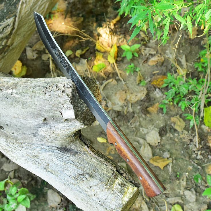 Close-up of the rosewood full tang handle on the 19-inch survival knife.
