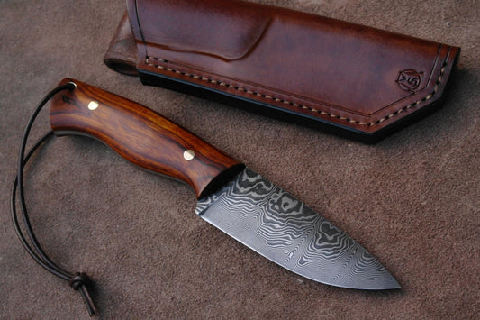 American Wilderness Bushcraft Knife with custom handmade Damascus steel blade.