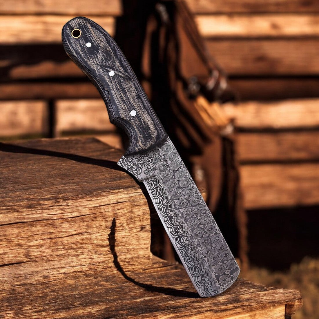 Tear drops Damascus steel blade pattern on bull cutter knife showing wave design