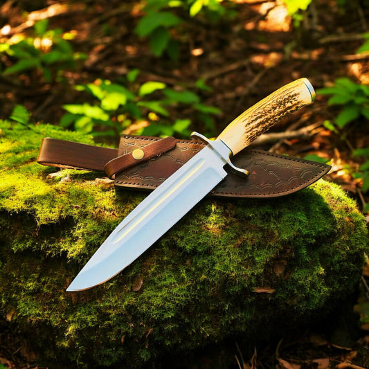 Custom handmade bowie knife with D2 steel blade and antler horn handle.
