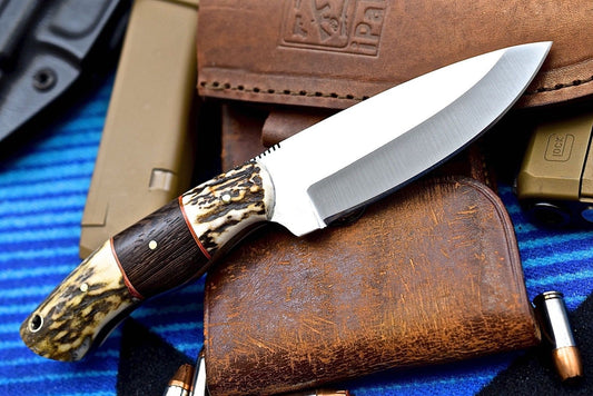 "Custom handmade hunting knife with D2 steel blade."