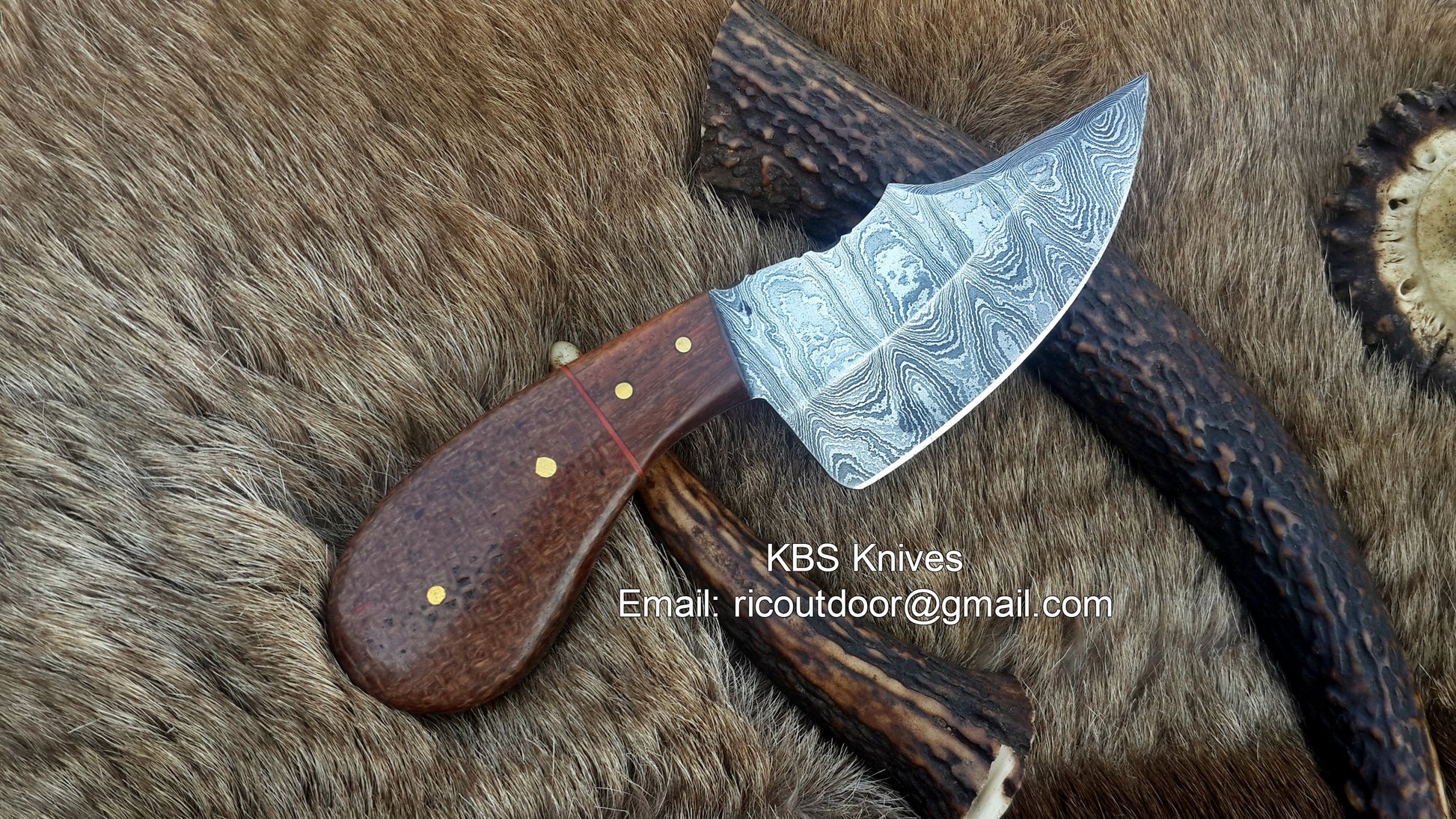 Custom skinning knife featuring a 3-inch full tang Damascus steel blade and a stylish canvas Micarta and rosewood handle.