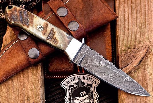   Damascus steel handmade skinning knife
