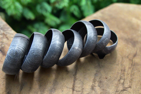 Groom wearing a custom Damascus steel groom's ring
