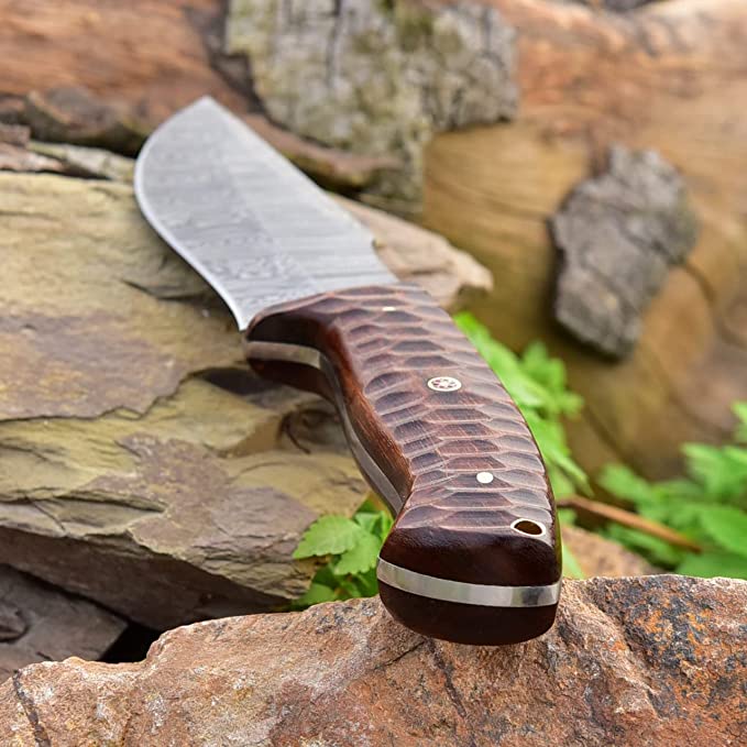 Experience the elegance of the Damascus Steel Hunting Knife with a Rose Wood Handle, measuring 10 inches, and equipped with a durable leather sheath.
