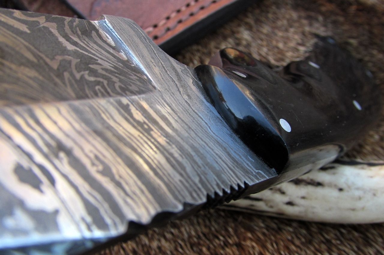 Close-up of the buffalo horn handle on the deer skinning knife.