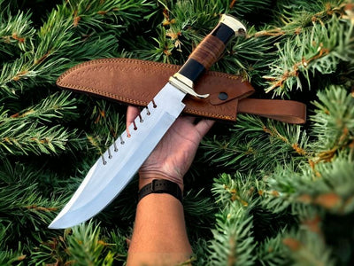 Frontier Legend Bowie Knife with custom handmade D2 steel blade and stacked leather handle.

