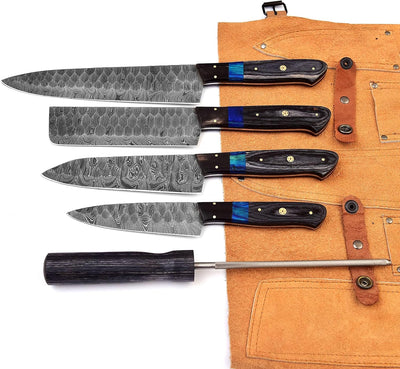 Collection of kitchen knives including chef knife and cleaver