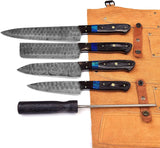 Collection of kitchen knives including chef knife and cleaver