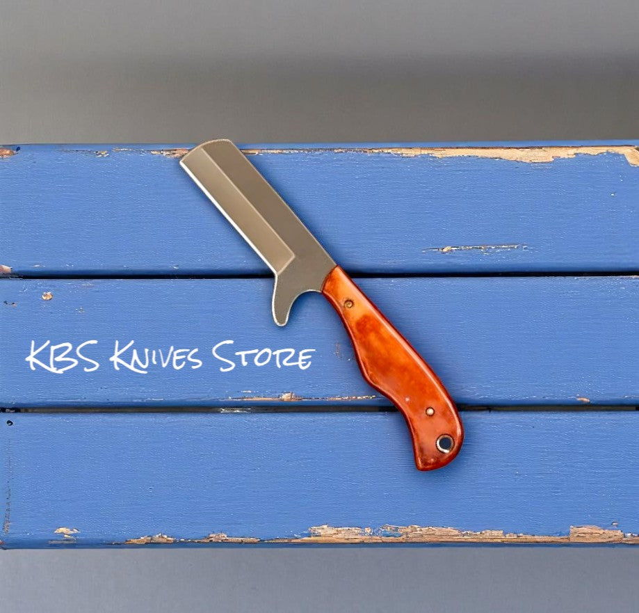 Bull cutter knife with D2 steel blade and orange bone handle including leather sheath