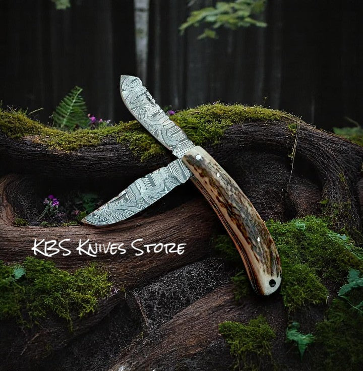 Custom 3 inch Damascus cowboy pocket knife with antler handle Western trapper design