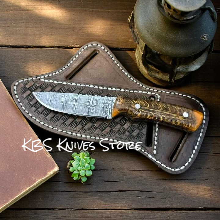 Custom Damascus steel cowboy knife and leather sheath with pine cone resin handle