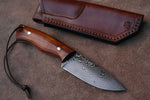 American Wilderness Bushcraft Knife with custom handmade Damascus steel blade.
