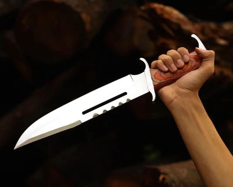 D2 steel blade on Rambo bowie knife showing blood groove and sharp tactical edge