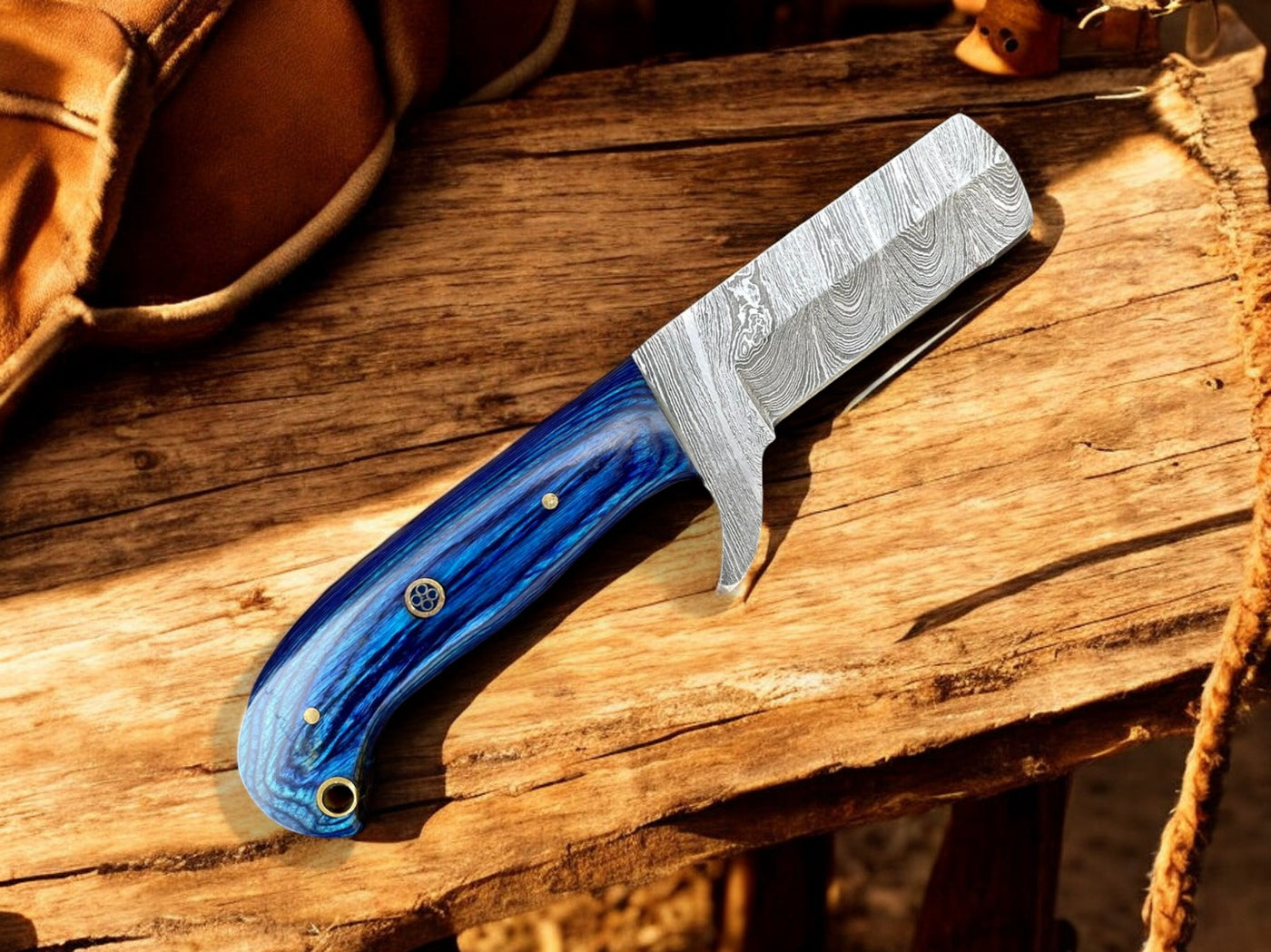 Damascus bull cutter knife in ranch cutting demonstration showing blade performance