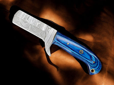 Exotic blue wood handle with natural grain on damascus bull cutter knife