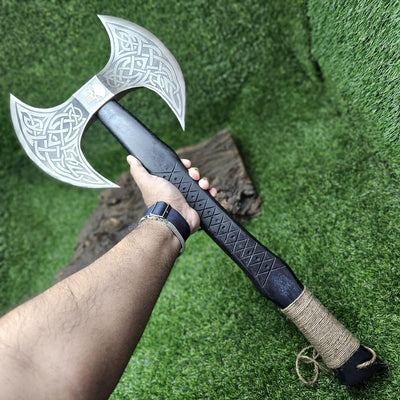 Viking axe with double-sided forged 1095 steel blade and hand-engraved black wood handle
