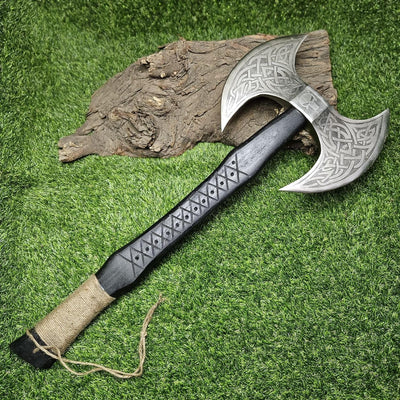 Viking axe with leather-wrapped black wood handle and included leather sheath

