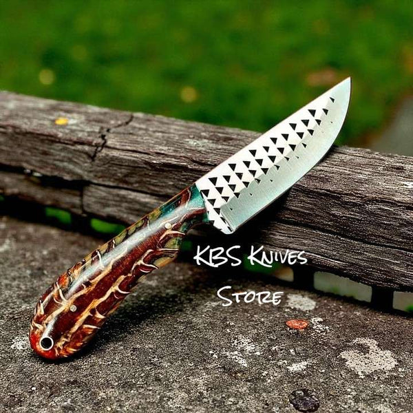 Working cowboy knife with 4 inch rasp steel blade and pine cone resin handle for lone riders
