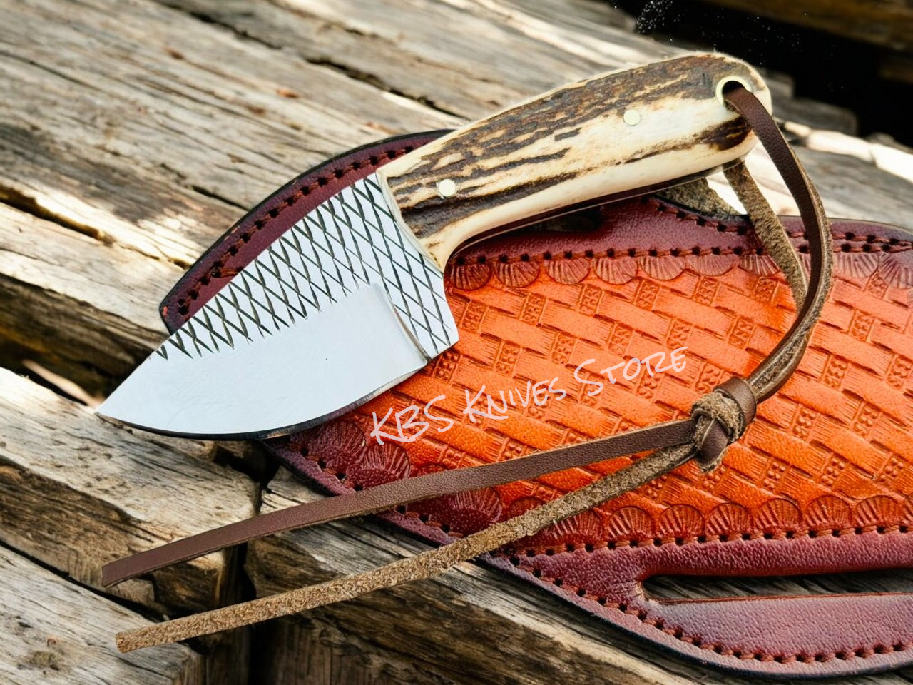 small cowboy knife with antler horn handle and sheath