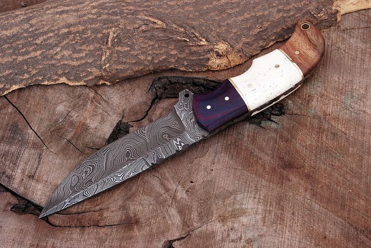 Custom Damascus steel hunting knife with G10, bone, and rosewood handle
