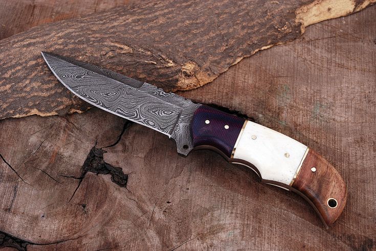 Handmade Damascus blade knife with G10 and leather sheath
