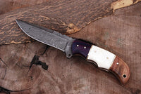 Handmade Damascus blade knife with G10 and leather sheath
