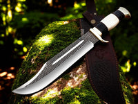 Detailed view of the polished bone and buffalo horn handle with brass guards, showcasing craftsmanship and grip stability.
