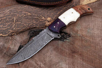 Custom hunting knife with G10, bone, and rosewood handle in a leather sheath
