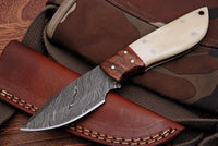 Custom Handmade Damascus Steel skinning knife with rosewood and bone handle, 8 inches.
