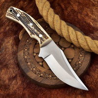 Deer skinning knife with full tang D2 steel blade and antler horn handle.
