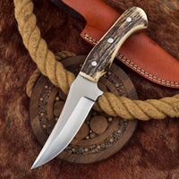 Great skinning knife with a 7.25-inch razor-sharp D2 steel blade and antler horn handle.
