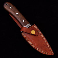 Great skinning knife for deer with walnut wood handle, Damascus guard, and leather sheath.
