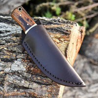 Great skinning knife with custom Damascus steel blade and rosewood and bone handle, Rockwell Hardness 55-58 HRC.
