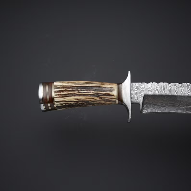 Bowie knife with Twist Damascus steel blade, Antler Horn handle, and steel guard, presented with a leather sheath.