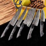 5-piece kitchen knives set with forged Twist Damascus steel blades, Exotic Wood and Buffalo horn handles, presented in a leather roll. Culinary refinement at its finest.