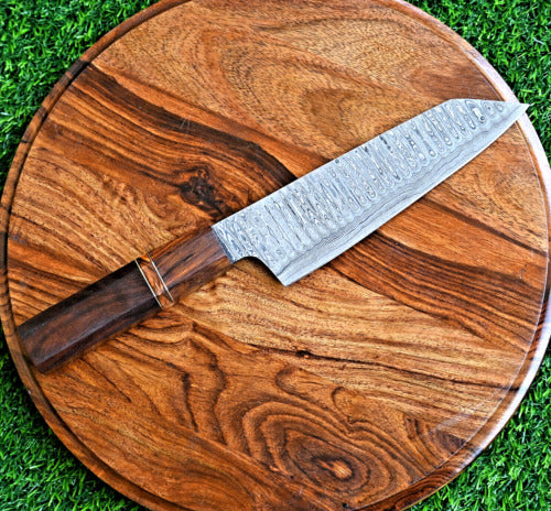 Custom Handmade Santoku knife with Damascus steel blade, Rosewood handle with Olivewood spacer, and leather roll. Perfect for precision cutting in the kitchen.