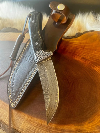 Damascus Hunting Skinning Knife with Sheep Horn Handle and Engraved Steel Guard