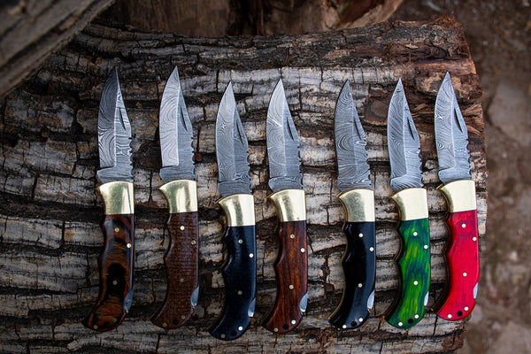 "Deal of Damascus Handmade Custom 7 Folding Pocket Knives with Different Color Wood Handles, 3-inch Blade Length, and Leather Case by KBS Knives Store"