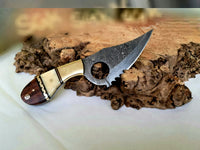 Damascus Steel Handmade Finger Hole Skinning Knife with Bone-Rose Wood and Brass Bolster Handle, Serrated Edge