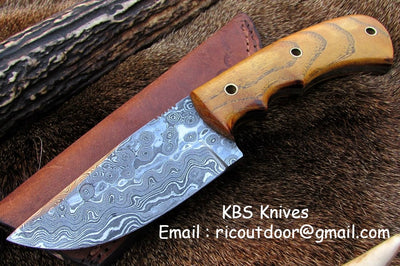 8.5-inch Damascus steel drop point skinning knife with a native wood handle.
