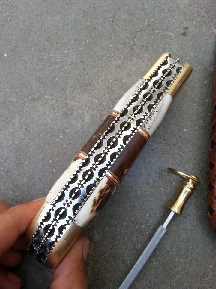 Close-up of the file work on the liner and spine of The Dual Edge Damascus Steel Knife
