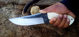 10.5-inch hunting knife with sharp edge and leather sheath
