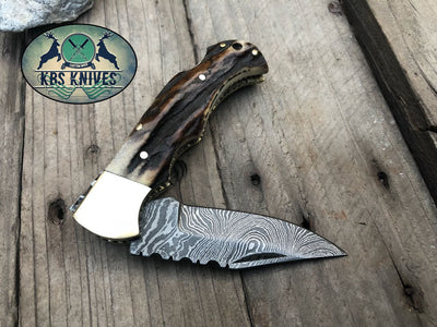 [DAMASCUS_KNIVES], [HUNTING_KNIVES], [KNIFE], [HANDMADE_KNIVES], [SKINNING_KNIVES], [DAGGER_KNIVES], [TRACKER_KNIVES], [KITCHEN_KNIVES], [FOLDING_KNIVES] - KBS Knives Store