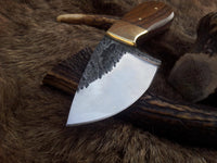 Close-up of the drop point blade made from hand-forged 1095 tool steel.
