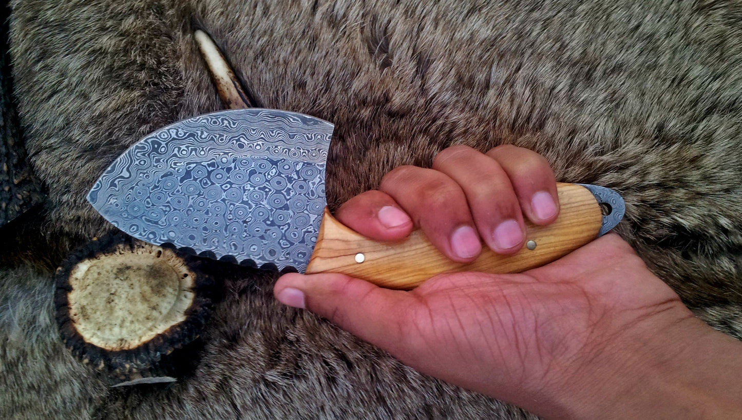 Full view of the 9-inch field dressing knife, emphasizing its craftsmanship and design.
