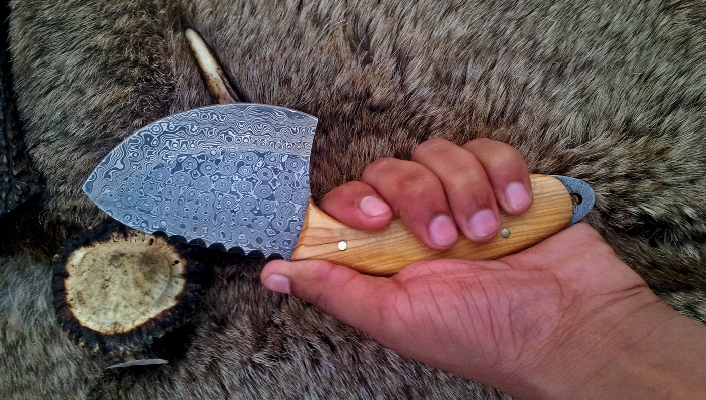 Full view of the 9-inch field dressing knife, emphasizing its craftsmanship and design.
