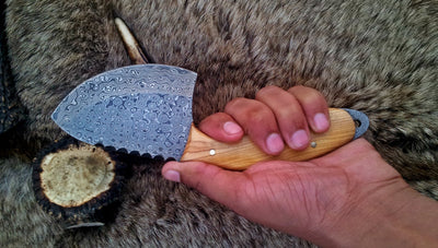 Full view of the 9-inch field dressing knife, emphasizing its craftsmanship and design.
