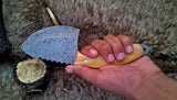 Full view of the 9-inch field dressing knife, emphasizing its craftsmanship and design.
