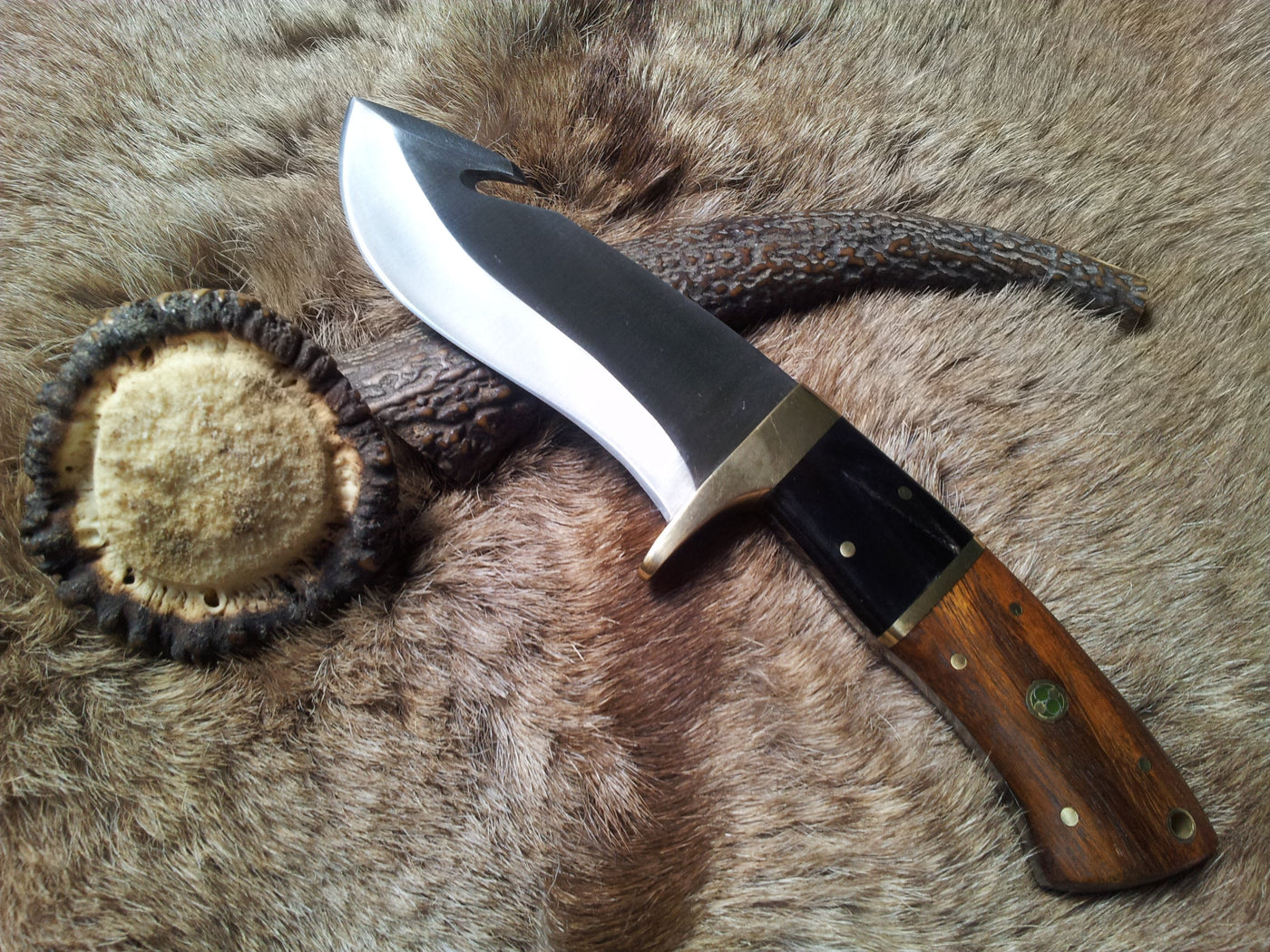 Robust Guthook knife for everyday carry, featuring 1095 high carbon steel blade and unique handle
